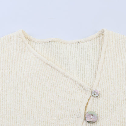 Asymmetric buckle knitted jacket