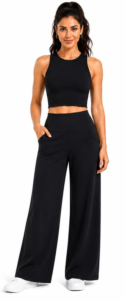 Fitolini wide leg performance pants in black with model wearing them on a white background