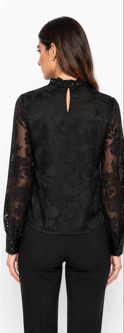 A woman modeling a black long-sleeve blouse with sheer floral lace sleeves and a high ruffled neckline, shown from both the front and back views against a plain white background.