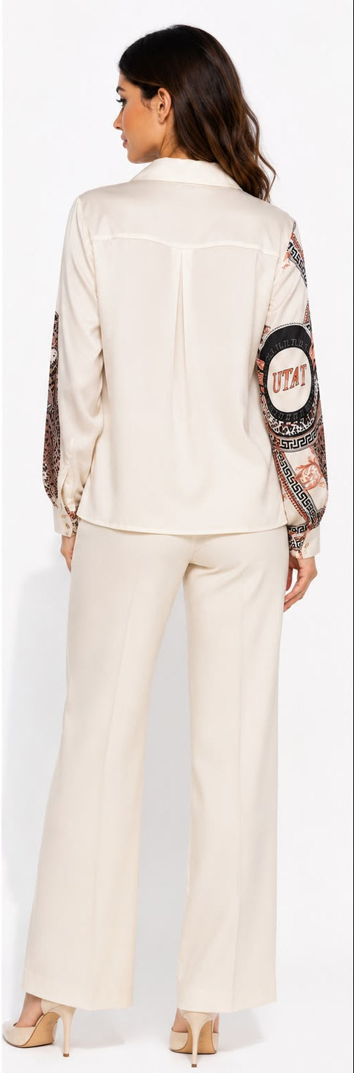 A woman modeling a two-piece cream satin pajama set with a leopard print and circular graphic pattern on the sleeves and chest, shown in front and back views against a white studio background.