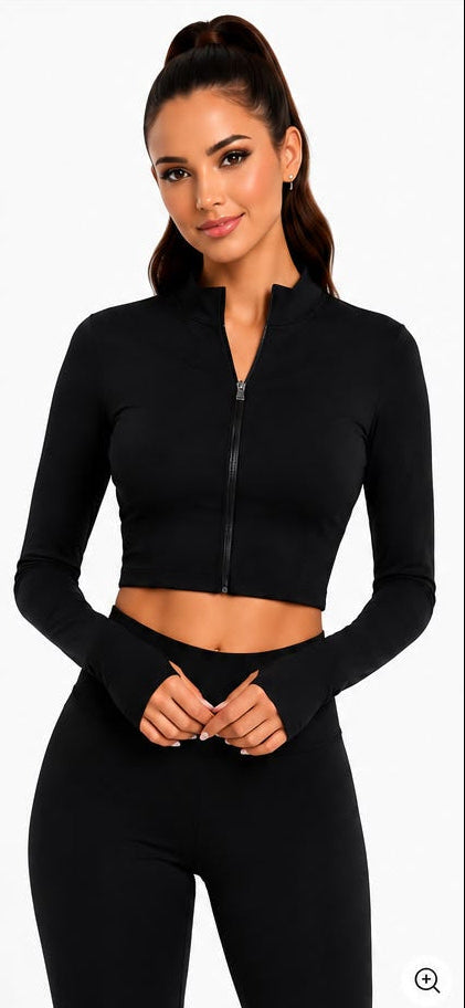 Ziba Couture black zip-up long sleeve top with product details and images on a website page.