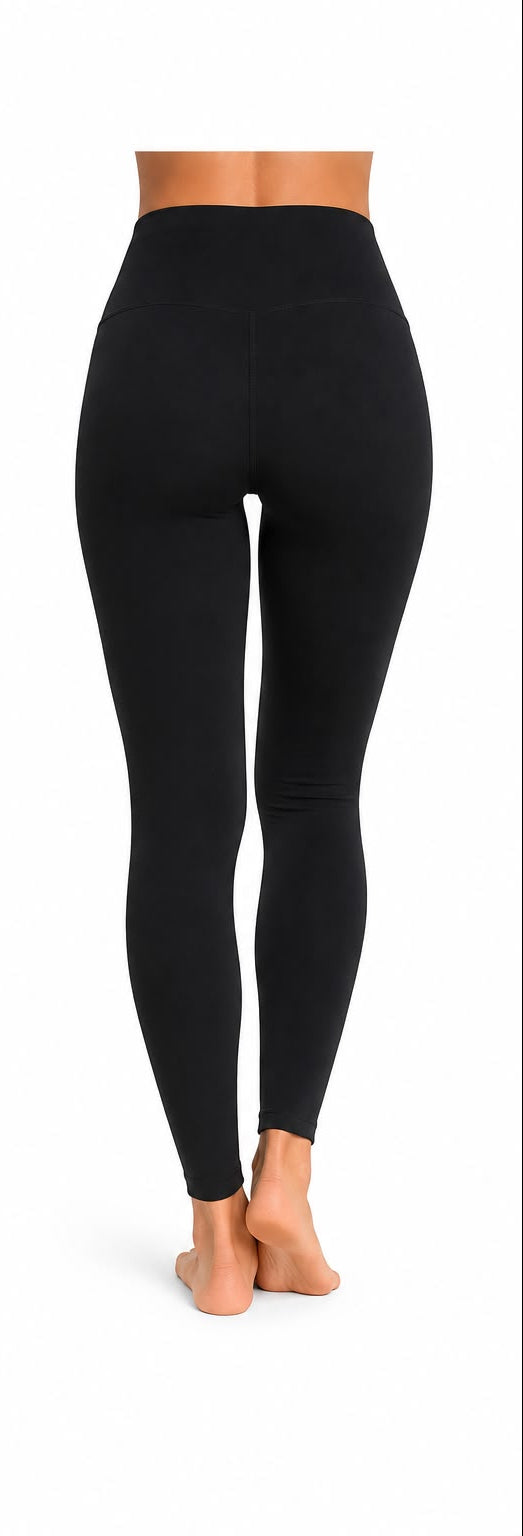 Black leggings worn by a person on a white background